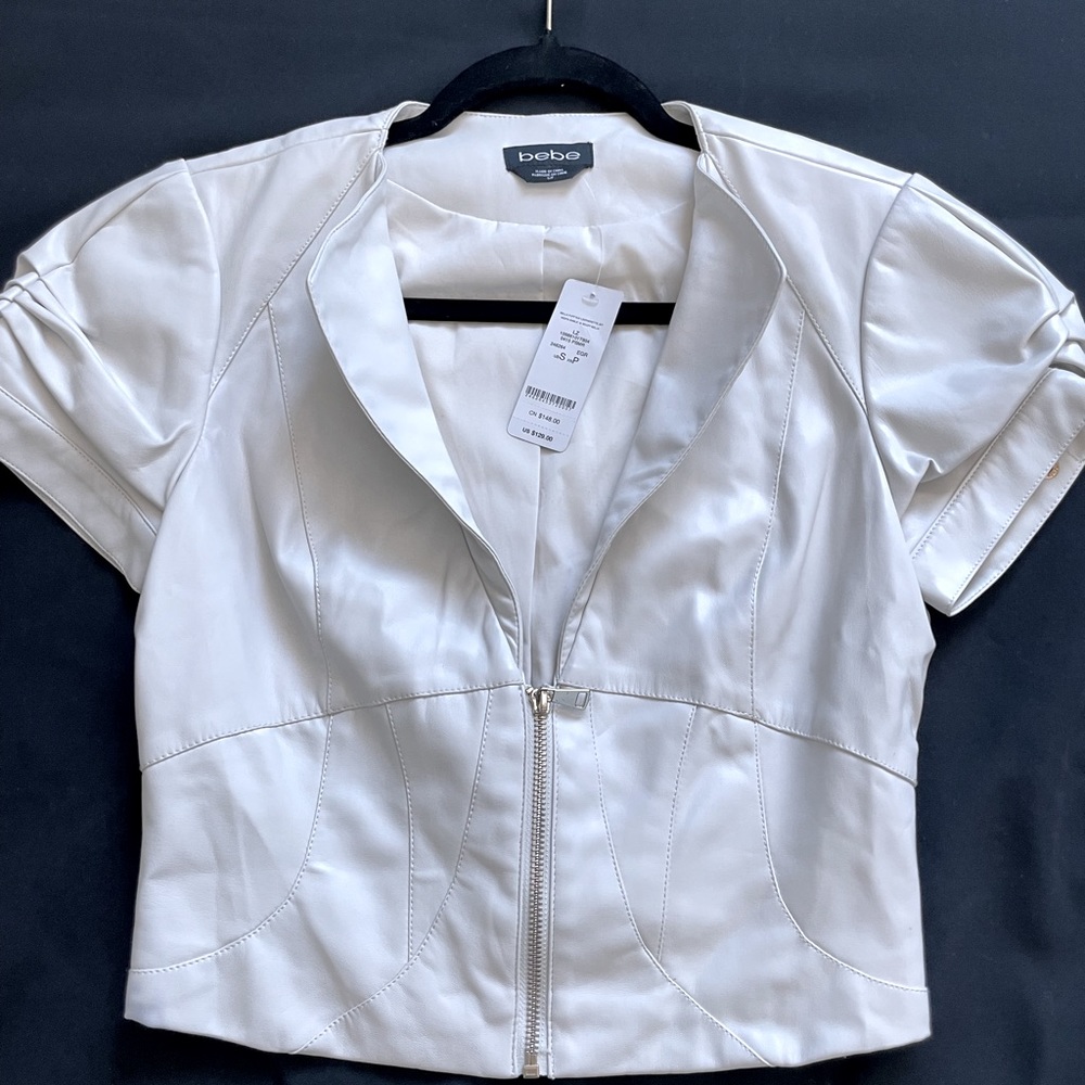 bebe brand.  White leather shirt/jacket. Size Small